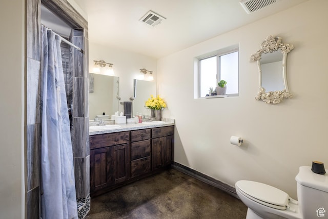 1018 S Valley View Ct, Moab, UT 84532 - bathroom featuring finished concrete floors, curtained shower, and double vanity