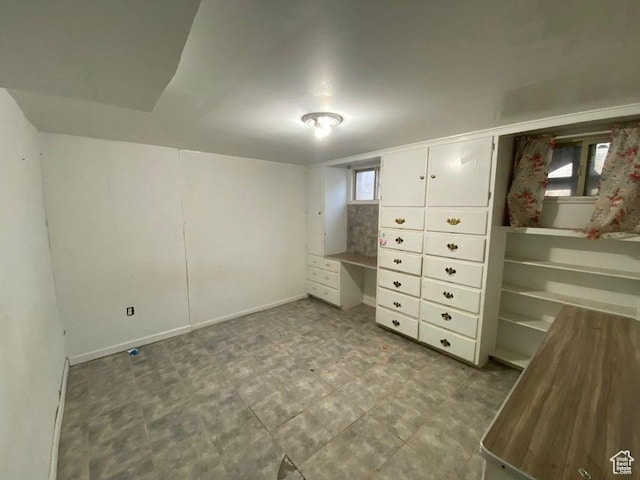 41 N 300 E, Richfield, UT 84701 - unfurnished bedroom featuring baseboards and a desk