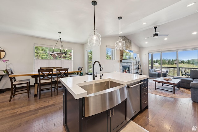 14482 N Buck Horn Trl Unit 50A, Heber City, UT 84032 - kitchen featuring open floor plan, a stone fireplace, plenty of natural light, light countertops, and vaulted ceiling