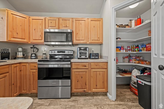 2371 N 1110 W, Clinton, UT 84015 - kitchen featuring stainless steel appliances and light countertops