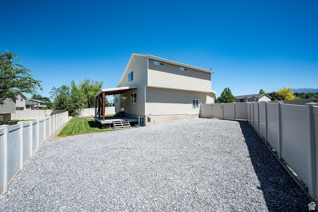 2371 N 1110 W, Clinton, UT 84015 - rear view of property featuring a fenced backyard