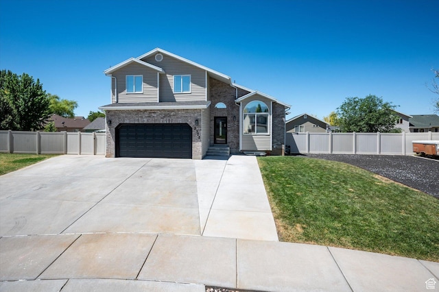 2371 N 1110 W, Clinton, UT 84015 - view of front of home with a garage, driveway, and brick siding