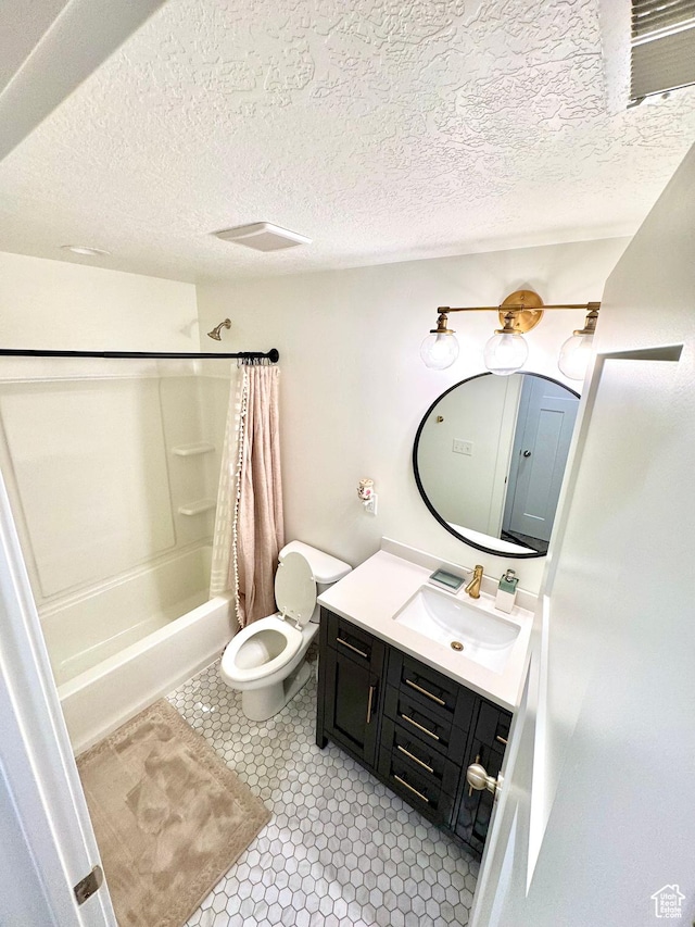 933 S 2100 W, Orem, UT 84059 - full bathroom featuring vanity, shower / tub combo with curtain, and a textured ceiling