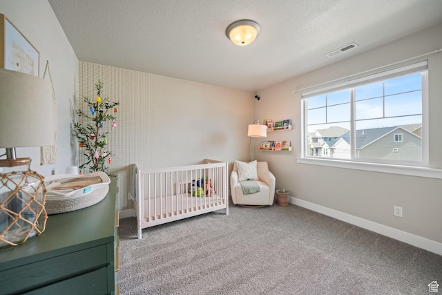 933 S 2100 W, Orem, UT 84059 - carpeted bedroom with a textured ceiling and a nursery area