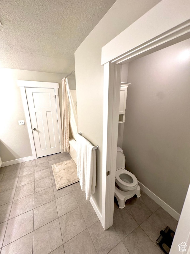 933 S 2100 W, Orem, UT 84059 - bathroom with tile patterned floors and a textured ceiling