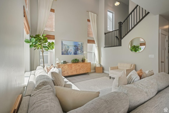 933 S 2100 W, Orem, UT 84059 - living area featuring a high ceiling, carpet, and stairs