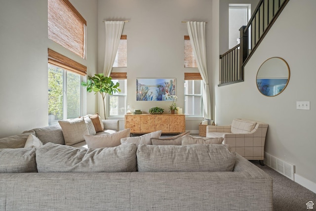 933 S 2100 W, Orem, UT 84059 - carpeted living area with a towering ceiling and stairway