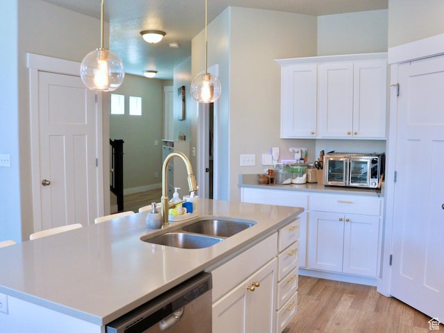 933 S 2100 W, Orem, UT 84059 - kitchen with dishwasher, light countertops, white cabinets, hanging light fixtures, and light wood finished floors