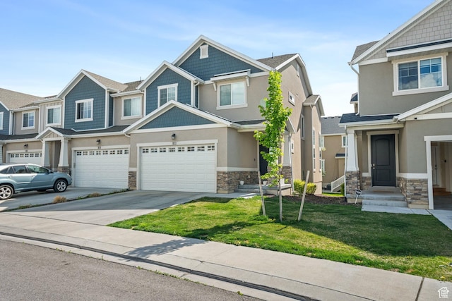933 S 2100 W, Orem, UT 84059 - craftsman-style home featuring stone siding, driveway, a front lawn, stucco siding, and a garage