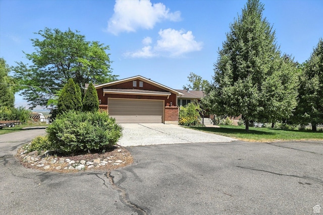 80 S 6000 W, Mendon, UT 84325 - single story home with asphalt driveway, a garage, and brick siding