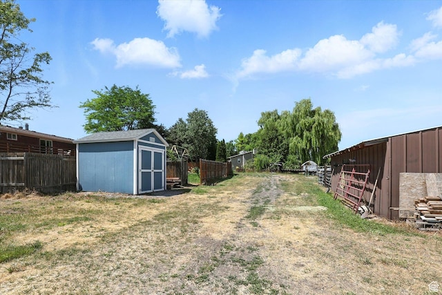 80 S 6000 W, Mendon, UT 84325 - view of yard featuring a storage unit