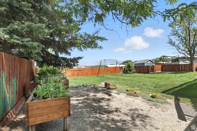 80 S 6000 W, Mendon, UT 84325 - fenced backyard featuring a playground