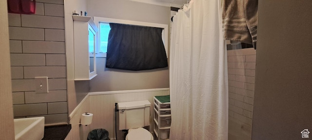 968 S Jeffreson, Ogden, UT 84404 - full bathroom featuring a wainscoted wall and curtained shower
