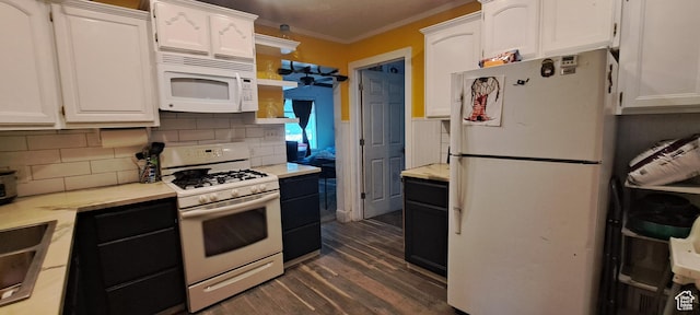 968 S Jeffreson, Ogden, UT 84404 - kitchen featuring white appliances, white cabinets, dark wood-type flooring, crown molding, and light countertops