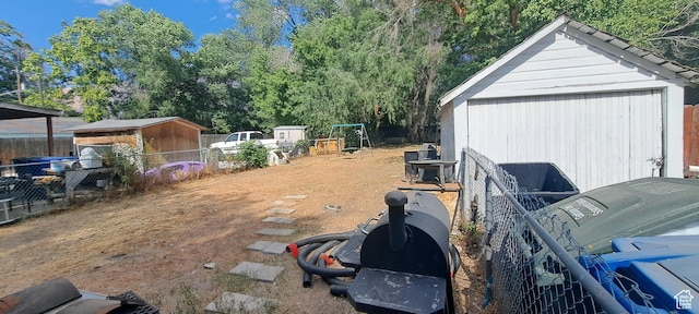 968 S Jeffreson, Ogden, UT 84404 - view of yard with a storage unit and view of scattered trees