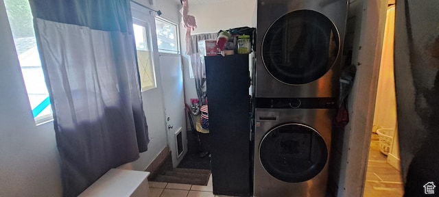 968 S Jeffreson, Ogden, UT 84404 - laundry room with estacked washer and dryer and tile patterned flooring