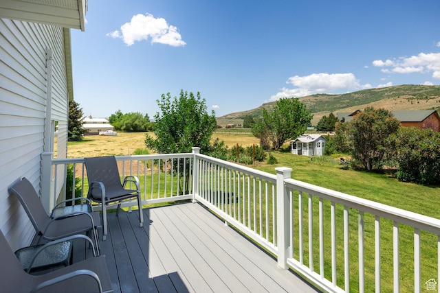 2565 E Woodland Way, Kamas, UT 84036 - deck featuring a mountain view and a yard