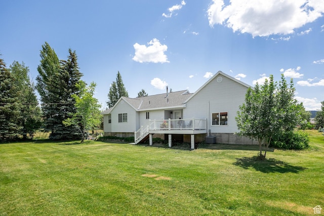 2565 E Woodland Way, Kamas, UT 84036 - back of property with a lawn, a deck, and stairs