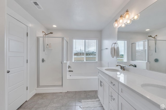 1769 W Stone Gate Dr, Saratoga Springs, UT 84045 - full bathroom featuring a shower stall, a bath, double vanity, recessed lighting, and tile patterned floors