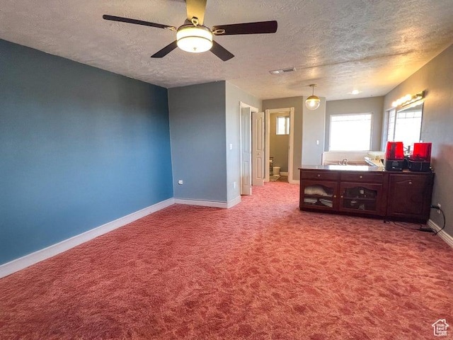 398 E Wells Fargo Rd, Brookside, UT 84782 - carpeted bedroom with a textured ceiling and ceiling fan