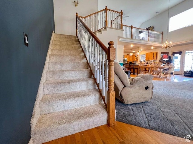398 E Wells Fargo Rd, Brookside, UT 84782 - stairway featuring a towering ceiling, wood finished floors, and a chandelier