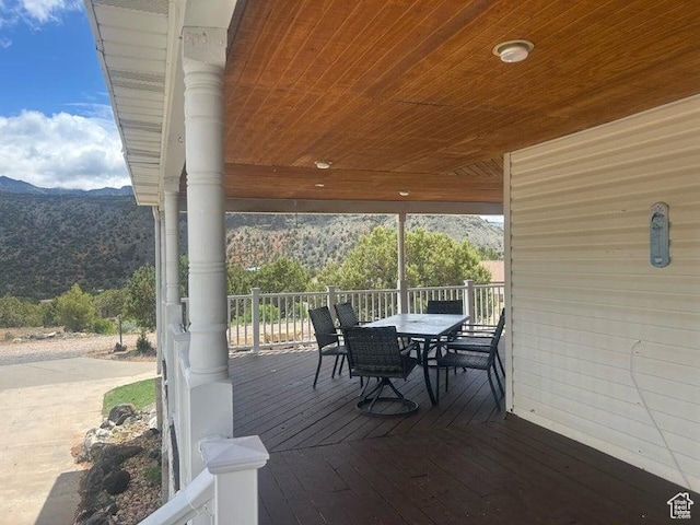 398 E Wells Fargo Rd, Brookside, UT 84782 - wooden terrace with a mountain view and outdoor dining space