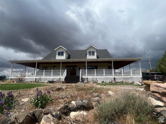 398 E Wells Fargo Rd, Brookside, UT 84782 - farmhouse inspired home with covered porch and a shingled roof