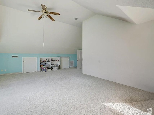 398 E Wells Fargo Rd, Brookside, UT 84782 - additional living space with lofted ceiling, light carpet, and a ceiling fan