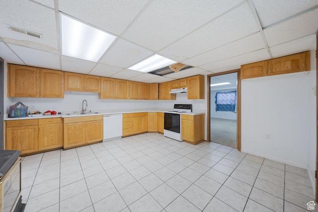 5350 S Jordan Canal Rd, Salt Lake City, UT 84129 - kitchen with white appliances, a drop ceiling, under cabinet range hood, and light countertops