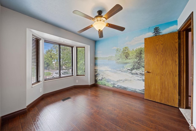 5350 S Jordan Canal Rd, Salt Lake City, UT 84129 - empty room with ceiling fan and wood-type flooring