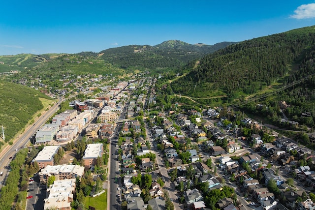 1003 Norfolk Ave, Park City, UT 84060 - aerial overview of property's location with a mountain backdrop and nearby suburban area