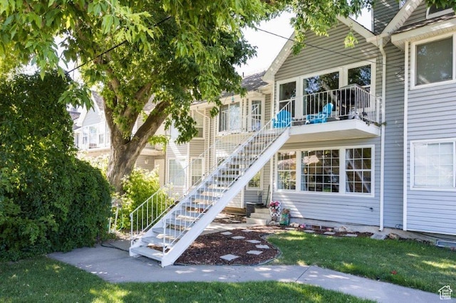 63 S 100 W Unit 17, American Fork, UT 84003 - view of exterior entry featuring a yard