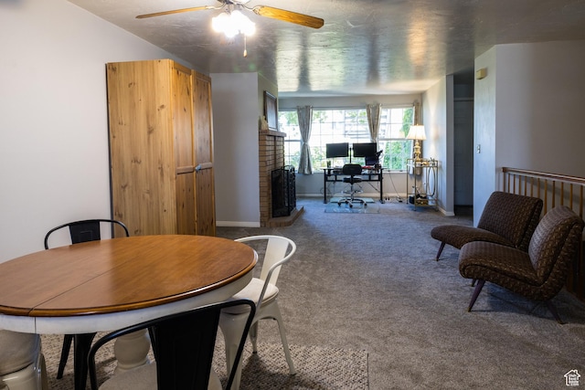 63 S 100 W Unit 17, American Fork, UT 84003 - dining area with carpet, a ceiling fan, an office area, and a brick fireplace