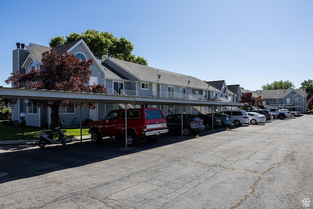 63 S 100 W Unit 17, American Fork, UT 84003 - partially covered parking lot with a residential view