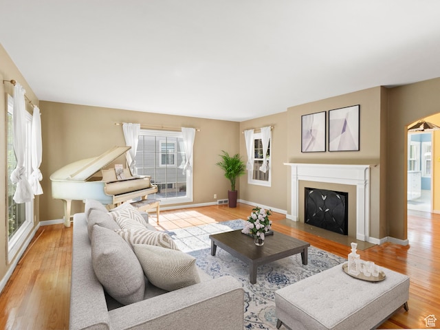 1740 E Harrison Ave, Salt Lake City, UT 84108 - living area featuring a fireplace with flush hearth and wood finished floors