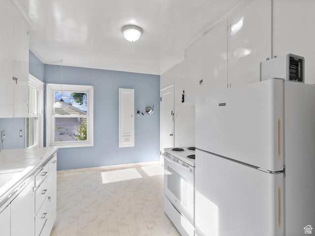 1740 E Harrison Ave, Salt Lake City, UT 84108 - kitchen featuring white appliances, tile countertops, and white cabinetry