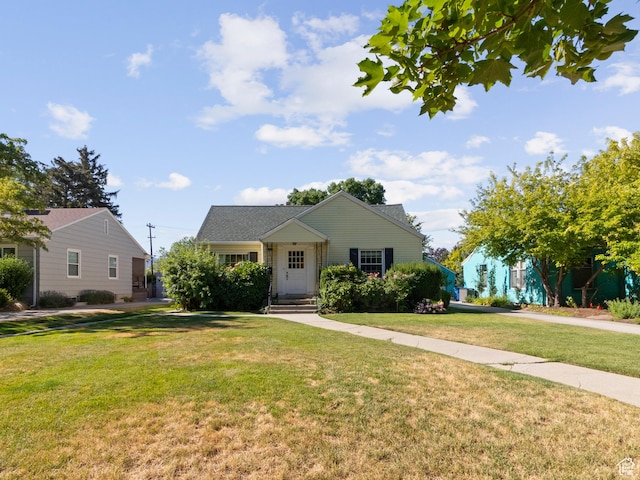 1740 E Harrison Ave, Salt Lake City, UT 84108 - bungalow-style home featuring a front lawn