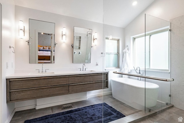 1675 W Silver Springs Rd, Park City, UT 84098 - bathroom featuring ensuite bathroom, double vanity, lofted ceiling, and a freestanding tub