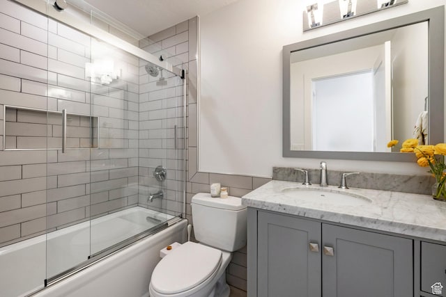 1675 W Silver Springs Rd, Park City, UT 84098 - full bathroom featuring vanity, shower / bath combination with glass door, and tile walls