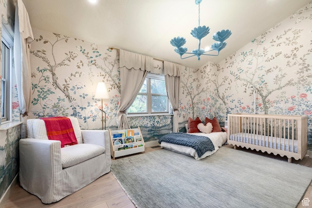 1675 W Silver Springs Rd, Park City, UT 84098 - bedroom featuring wallpapered walls and wood finished floors