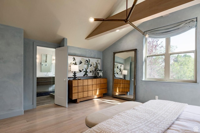 1675 W Silver Springs Rd, Park City, UT 84098 - bedroom with wood finished floors, lofted ceiling, and connected bathroom