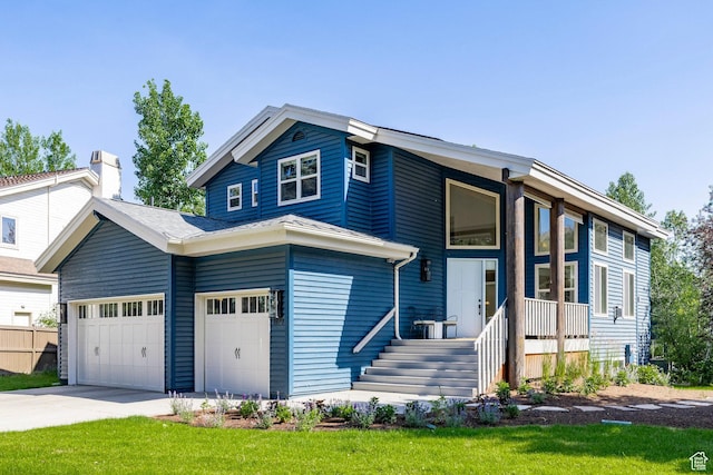 1675 W Silver Springs Rd, Park City, UT 84098 - view of front of property with concrete driveway, a garage, and a front lawn
