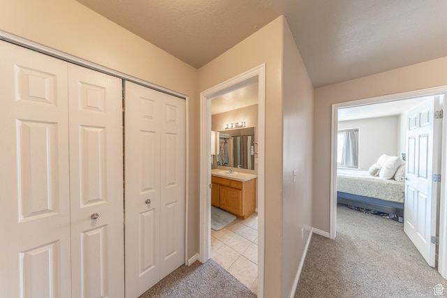 3963 S 2900 W Unit 2B, West Haven, UT 84401 - corridor featuring light colored carpet and light tile patterned flooring