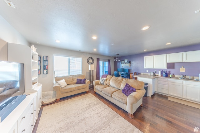 3963 S 2900 W Unit 2B, West Haven, UT 84401 - living area featuring dark wood-style floors and recessed lighting