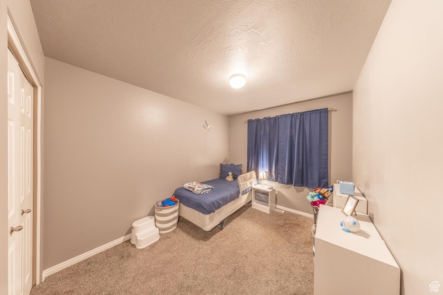 3963 S 2900 W Unit 2B, West Haven, UT 84401 - unfurnished bedroom featuring a textured ceiling and carpet flooring