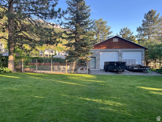 1990 E 400 N, Mapleton, UT 84664 - view of green lawn with a garage and an outbuilding