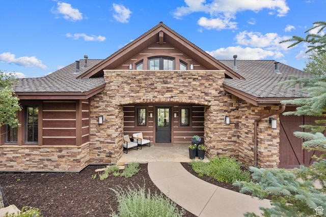 9388 Dye Cabins Dr, Park City, UT 84098 - view of front of house featuring stone siding and roof with shingles