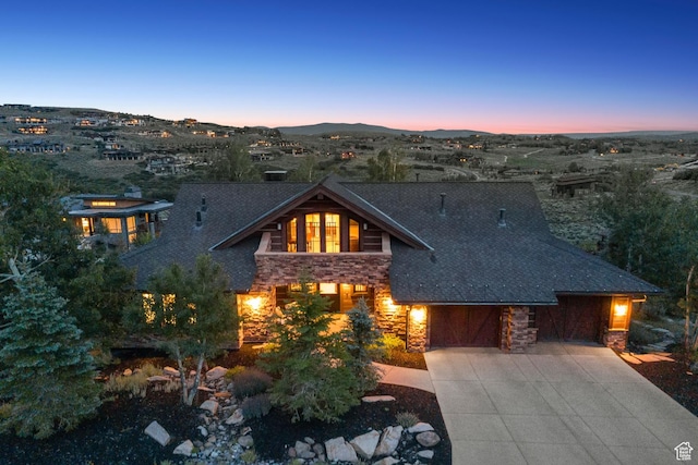 9388 Dye Cabins Dr, Park City, UT 84098 - view of front facade with stone siding and concrete driveway