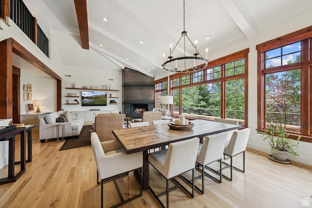 9388 Dye Cabins Dr, Park City, UT 84098 - dining space featuring beam ceiling, light wood-type flooring, high vaulted ceiling, a chandelier, and recessed lighting