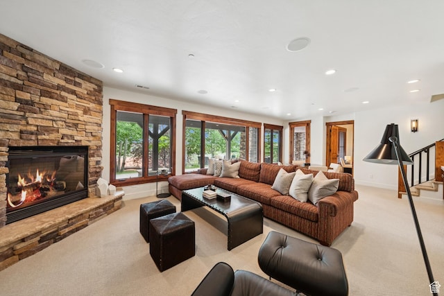 9388 Dye Cabins Dr, Park City, UT 84098 - living area featuring light carpet, recessed lighting, stairs, and a stone fireplace